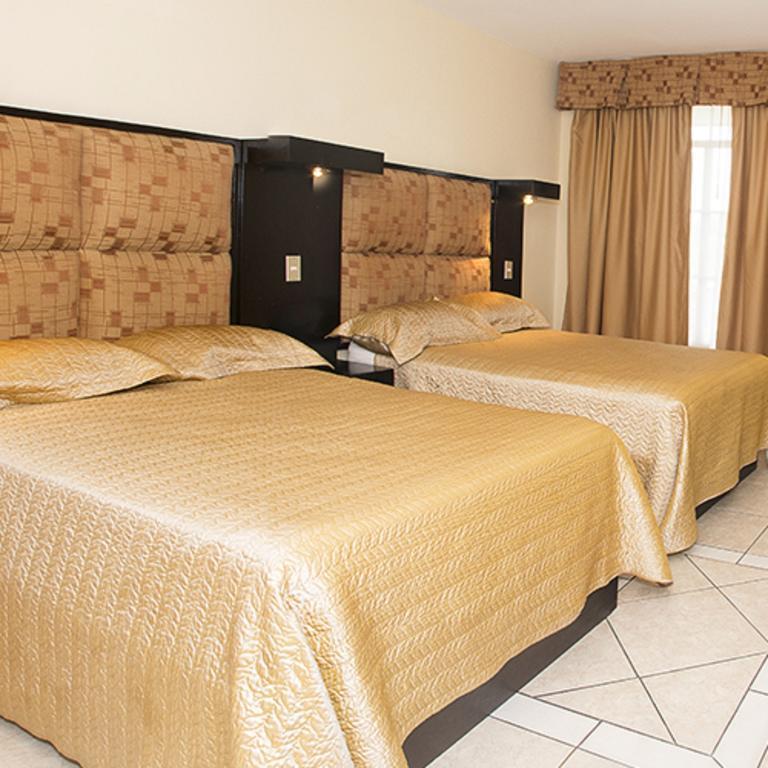 Hotel Tropico Inn Сан-Мигель Номер фото